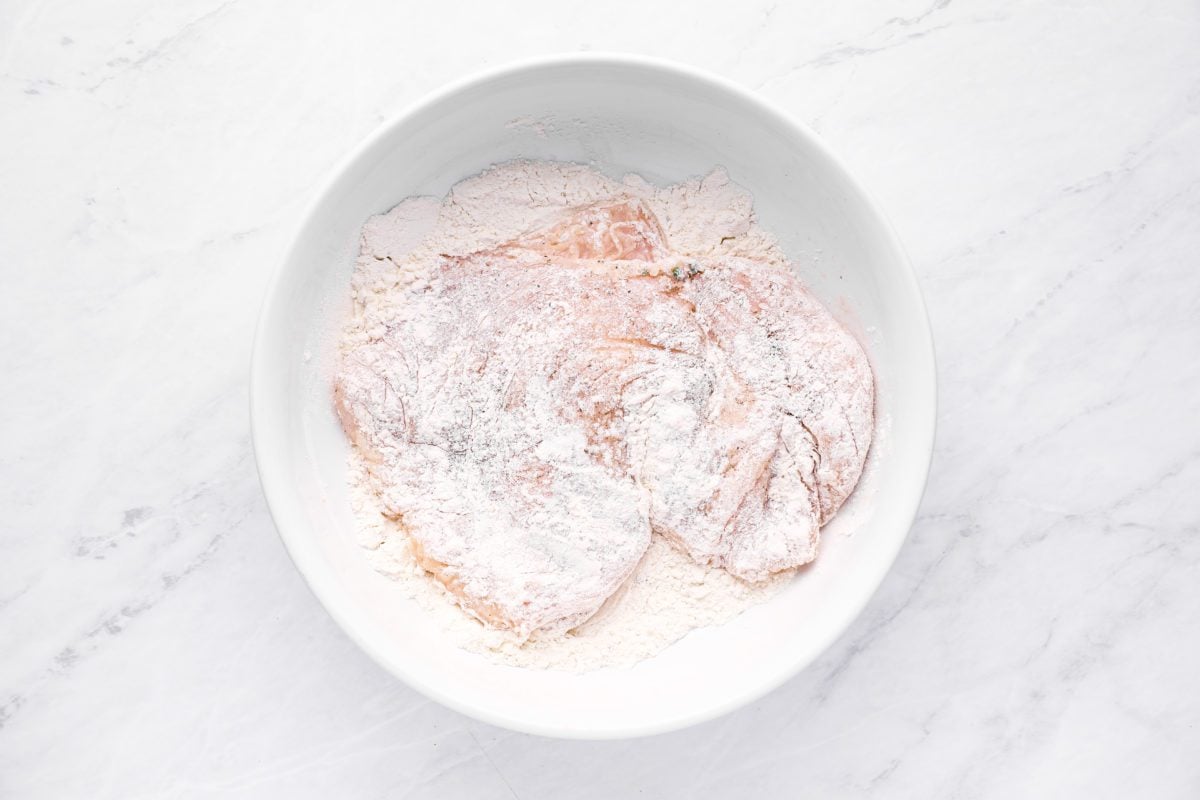 dredging chicken in flour