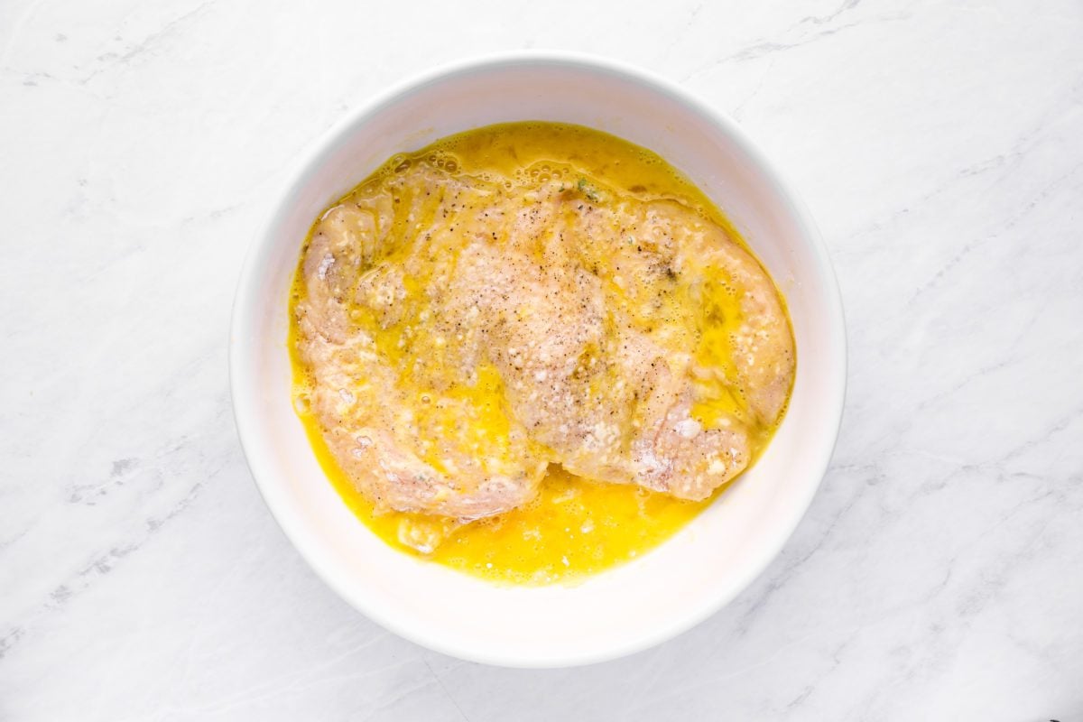dipping chicken in eggs