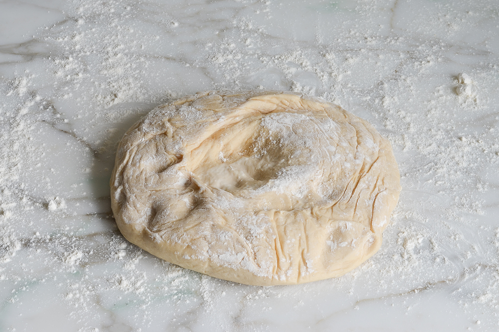 soft pretzel dough on floured surface