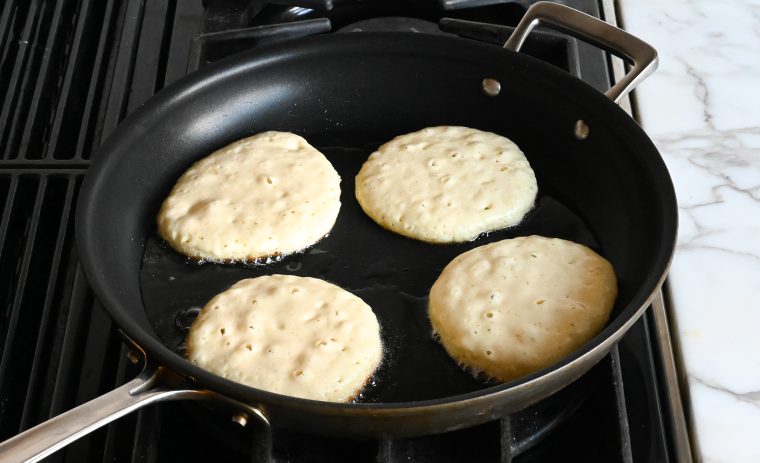 cooking pancakes on first side
