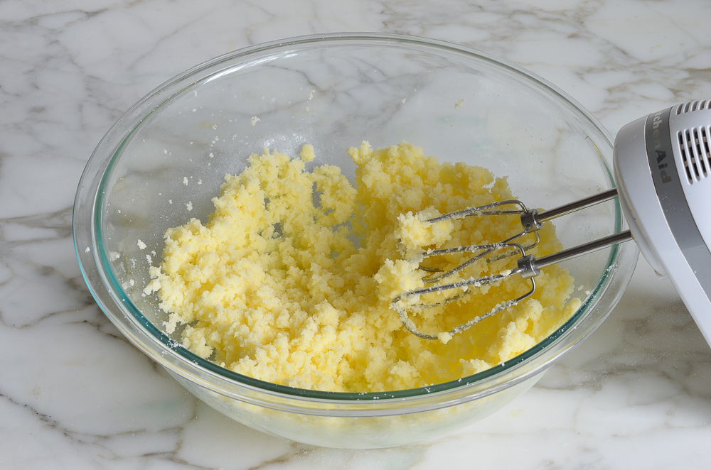 Bowl of beaten butter and sugar.