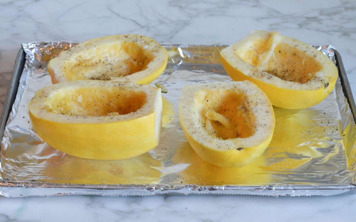 seasoning squash with oil, salt, and pepper