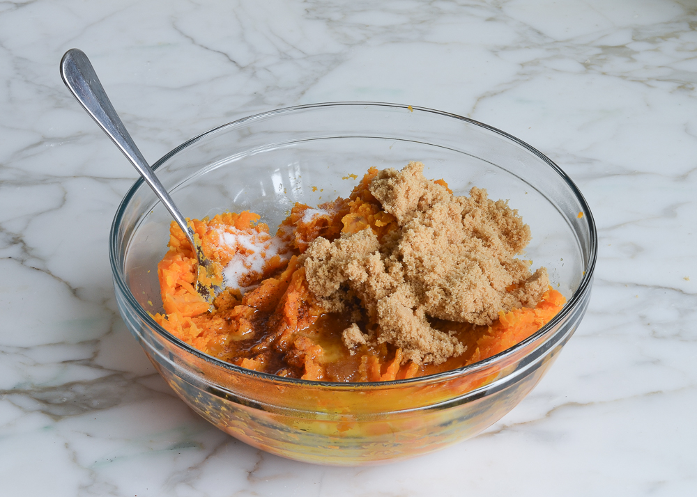 Mashed sweet potato topped with butter and other toppings.