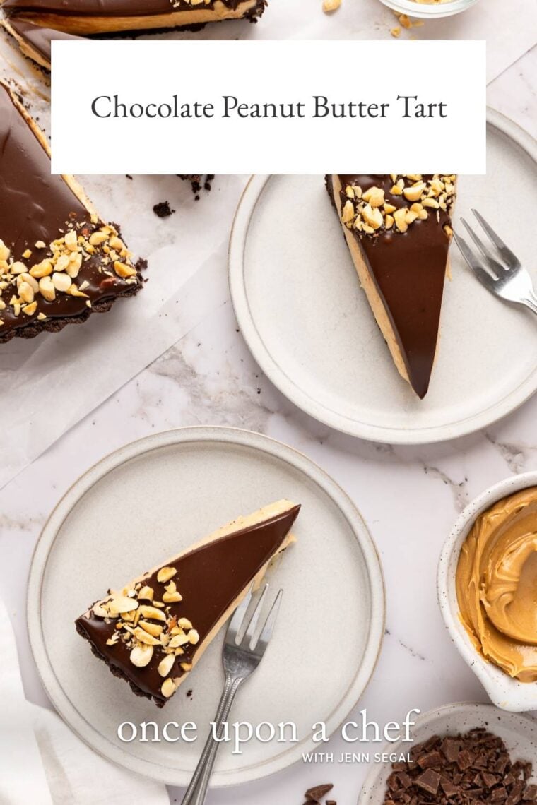 2 plates with slices of chocolate peanut butter tart and forks