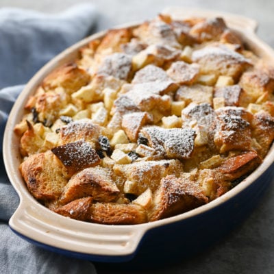 Dish of apple rum raising bread pudding.