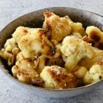 Bowl of roasted cauliflower.