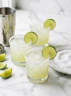 Margarita cocktails garnished with lime slices