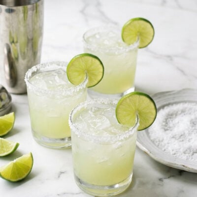 Margarita cocktails garnished with lime slices