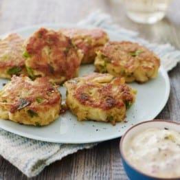 Plate of Crab Cakes with tartar sauce.