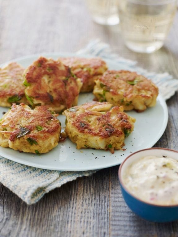 Plate of Crab Cakes with tartar sauce.