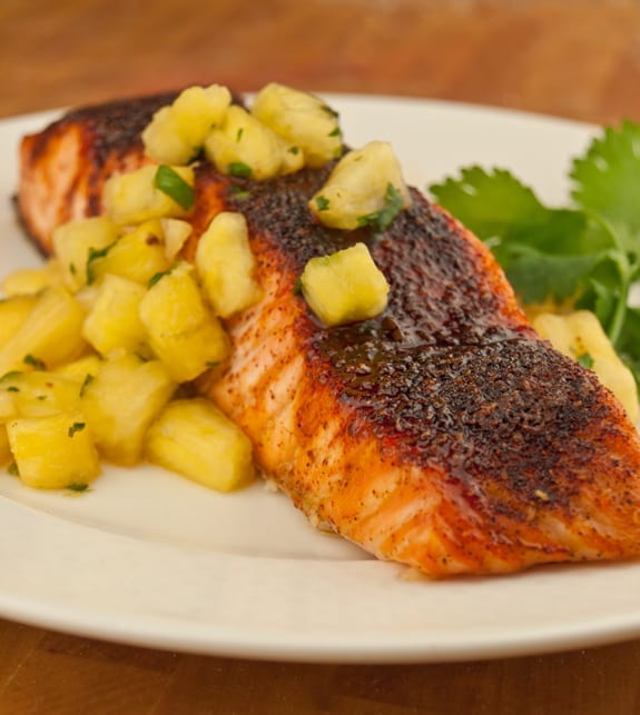 Maple-glazed salmon topped with pineapple salsa.