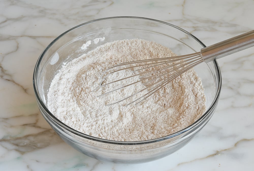 Whisk in a mixing bowl of dry ingredients.