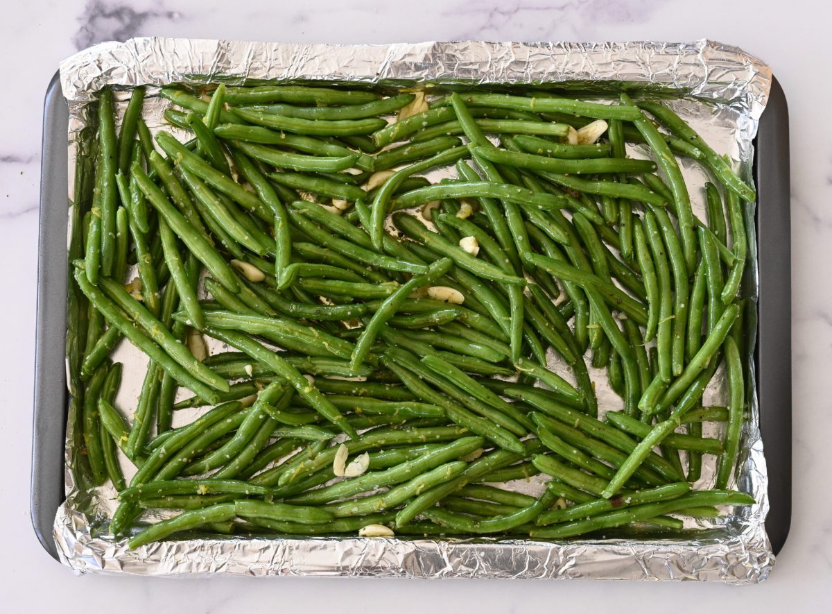 green bean mixture on baking sheet