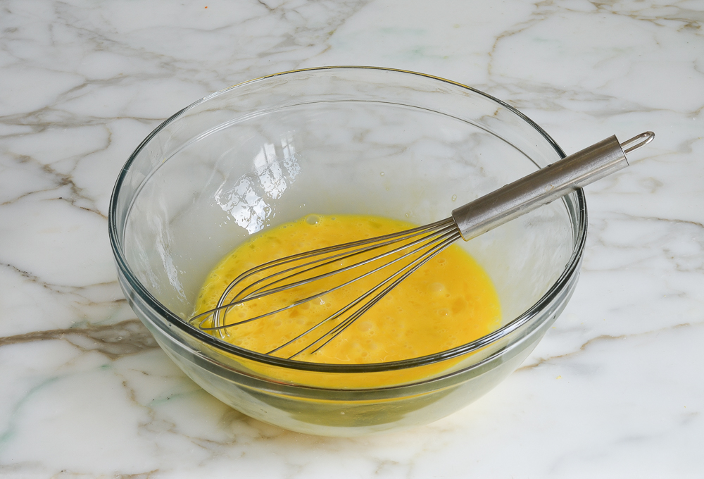 whisked eggs in bowl for lemon filling