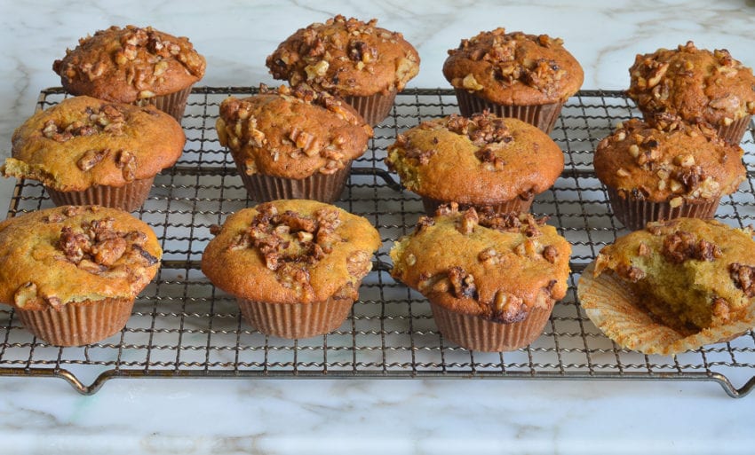 baked banana nut muffins cooling on rack