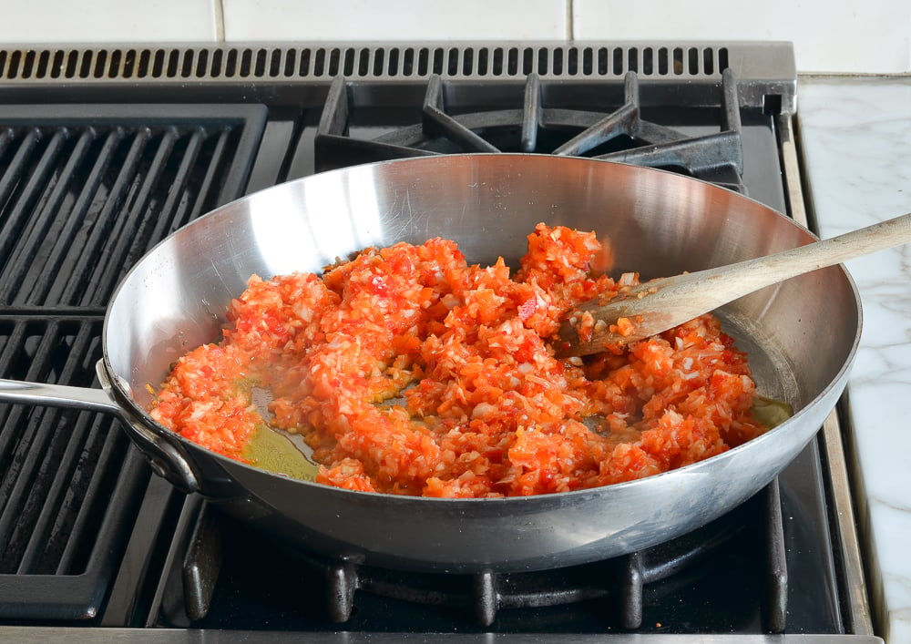 Chopped vegetables in a skillet.