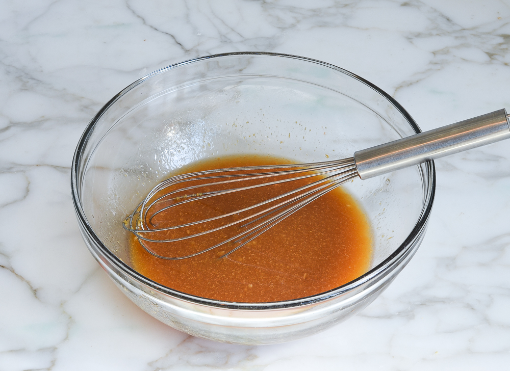 whisked dressing in mixing bowl