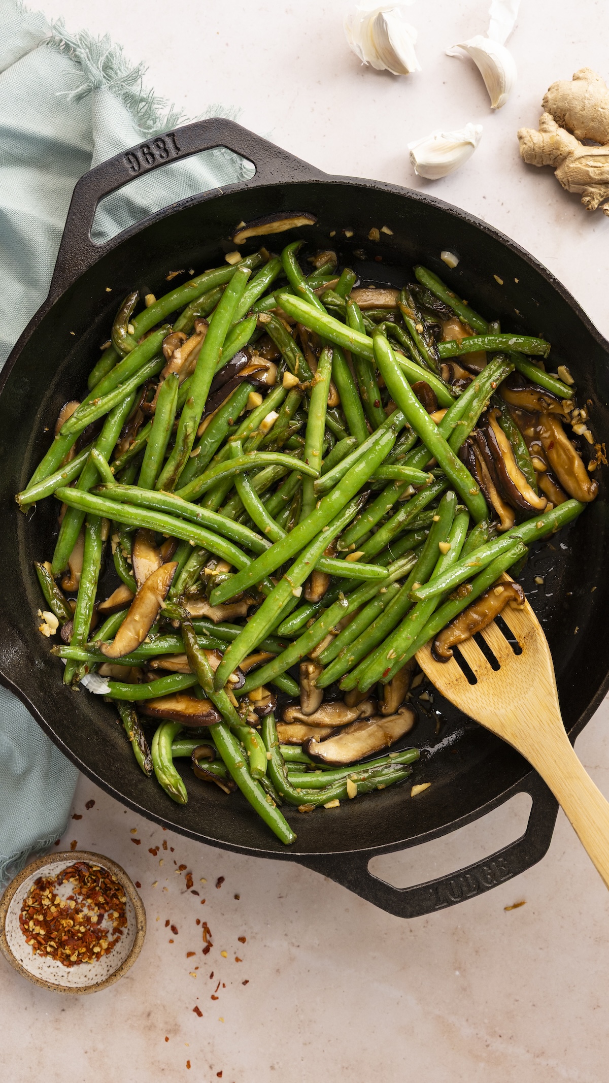 Cooked Szechuan green beans in skillet