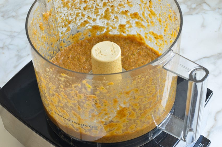 blended ingredients for marinade in food processor bowl