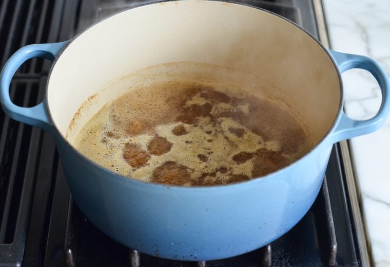 Dutch oven of boiling broth.