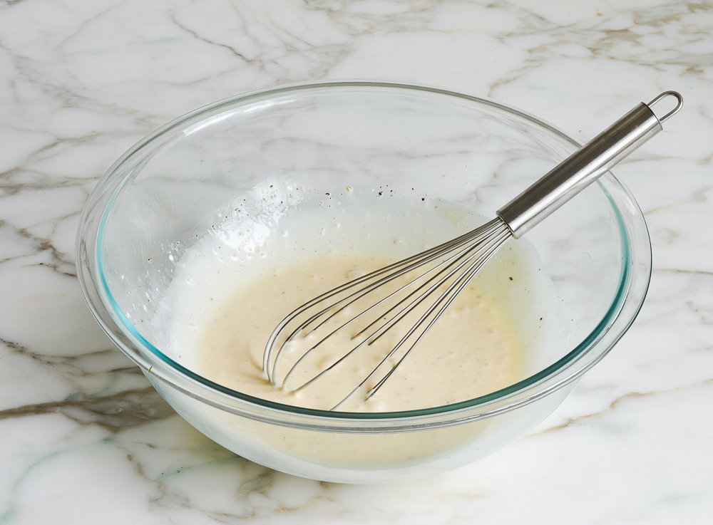 whisked creamy dreamy dressing in mixing bowl