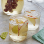 Two glasses of sparkling white sangria.