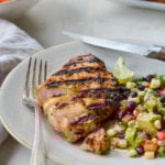 Grilled tequila lime chicken on a plate with salad.