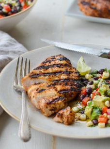 Grilled tequila lime chicken on a plate with salad.