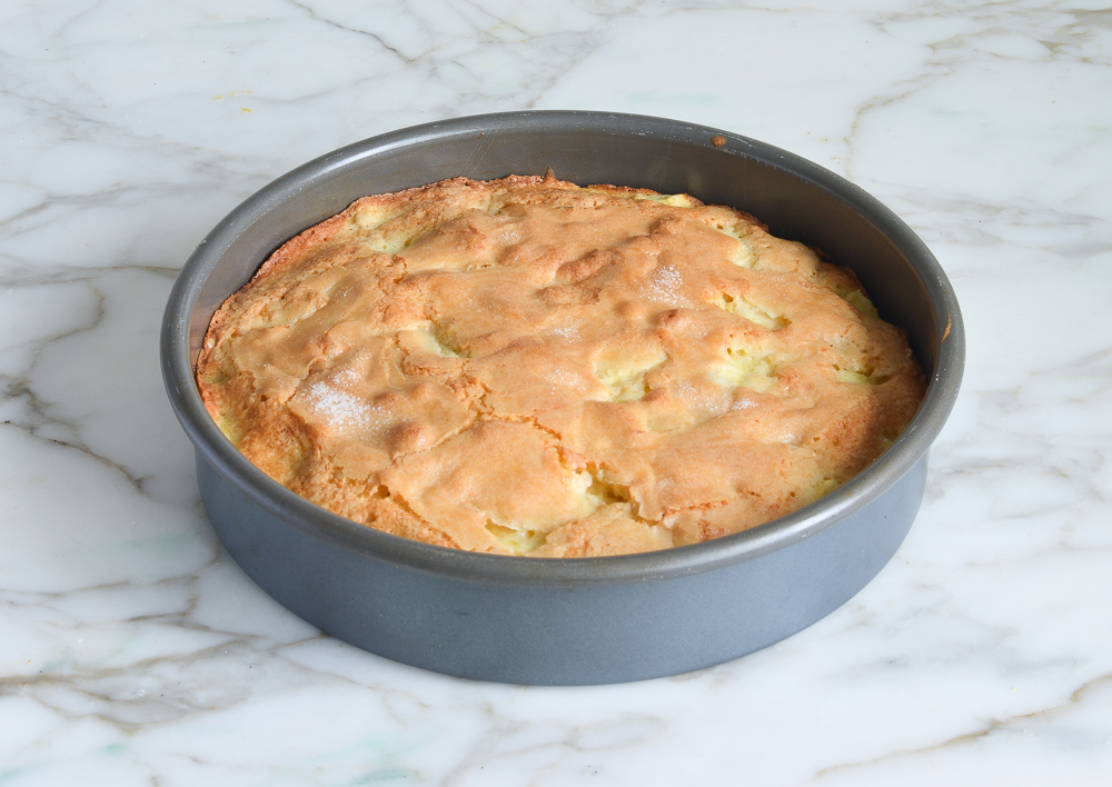 French apple cake in a cake pan.