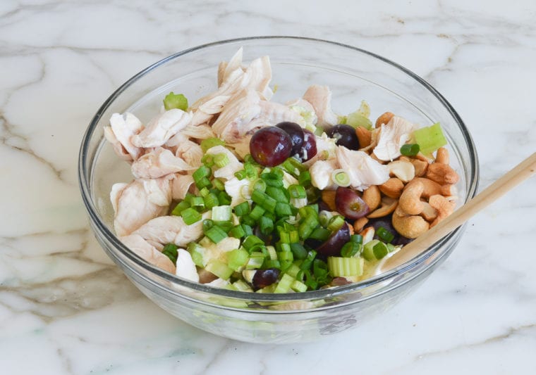 adding chicken, grapes, cashews, celery, and scallions