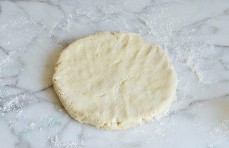 scone dough pressed into ball