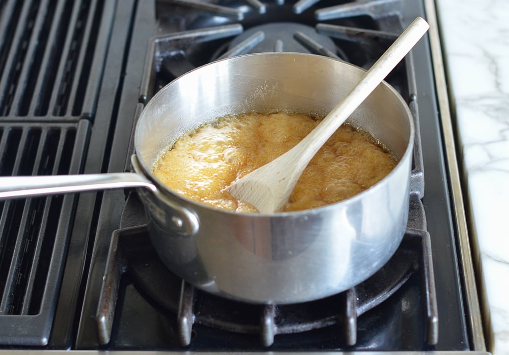 Sauce pan of boiling sugar mixture.