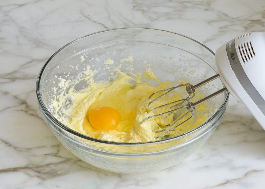 adding eggs to butter/sugar mixture