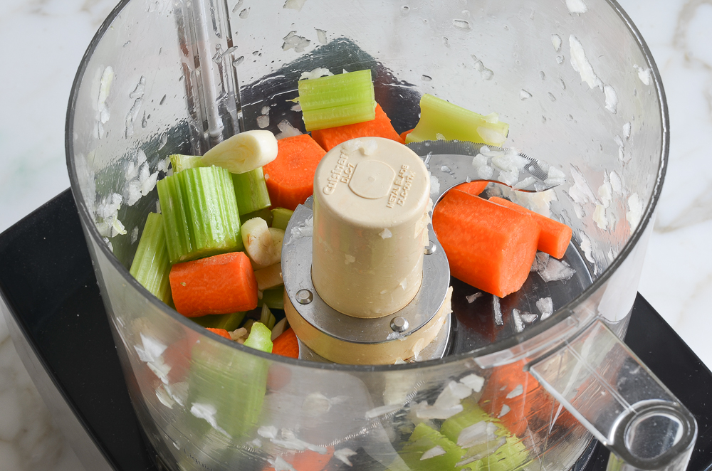 carrots, celery and garlic in food processor