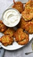 Platter of latkes and sour cream.