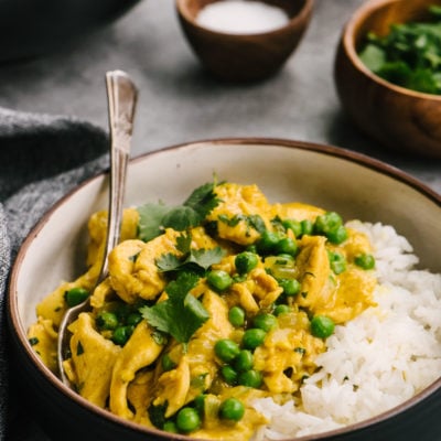 Chicken curry and rice in a bowl.