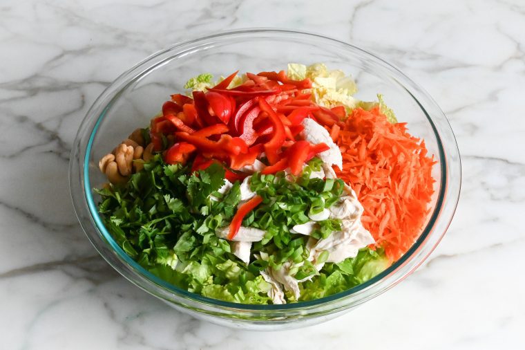 all of the salad ingredients combined in a large bowl