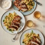 Plates of grilled Moroccan chicken.