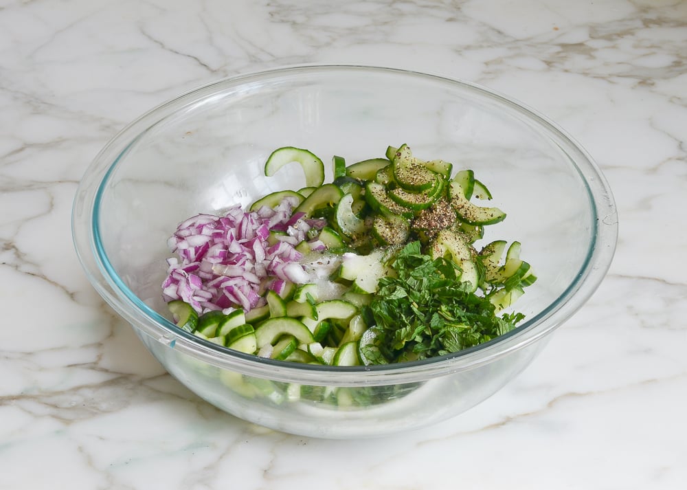 salad ingredients in mixing bowl