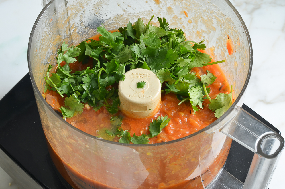 slightly chunky salsa with cilantro and lime in food processor