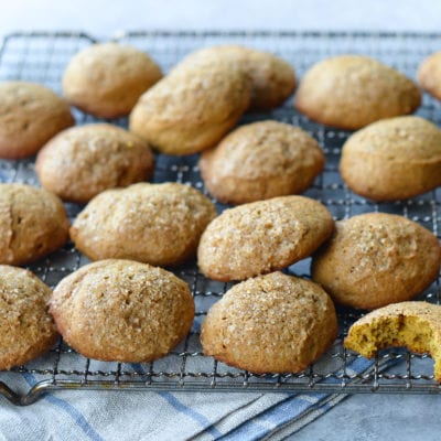 Spiced pumpkin cookies on a wire rack.