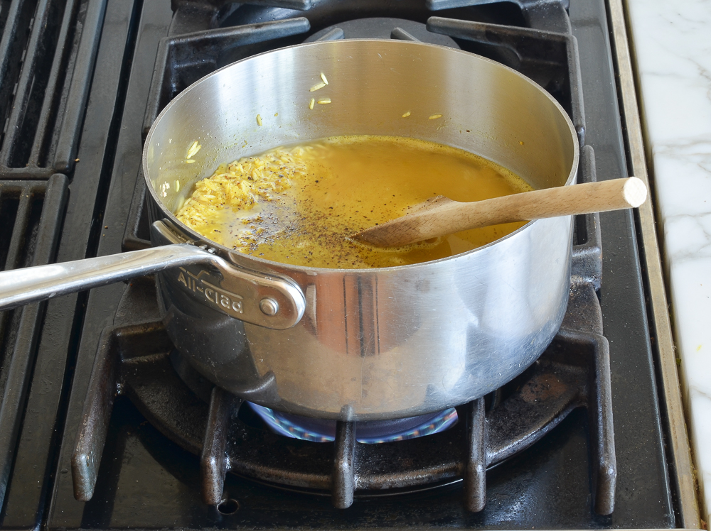 adding the water and seasoning