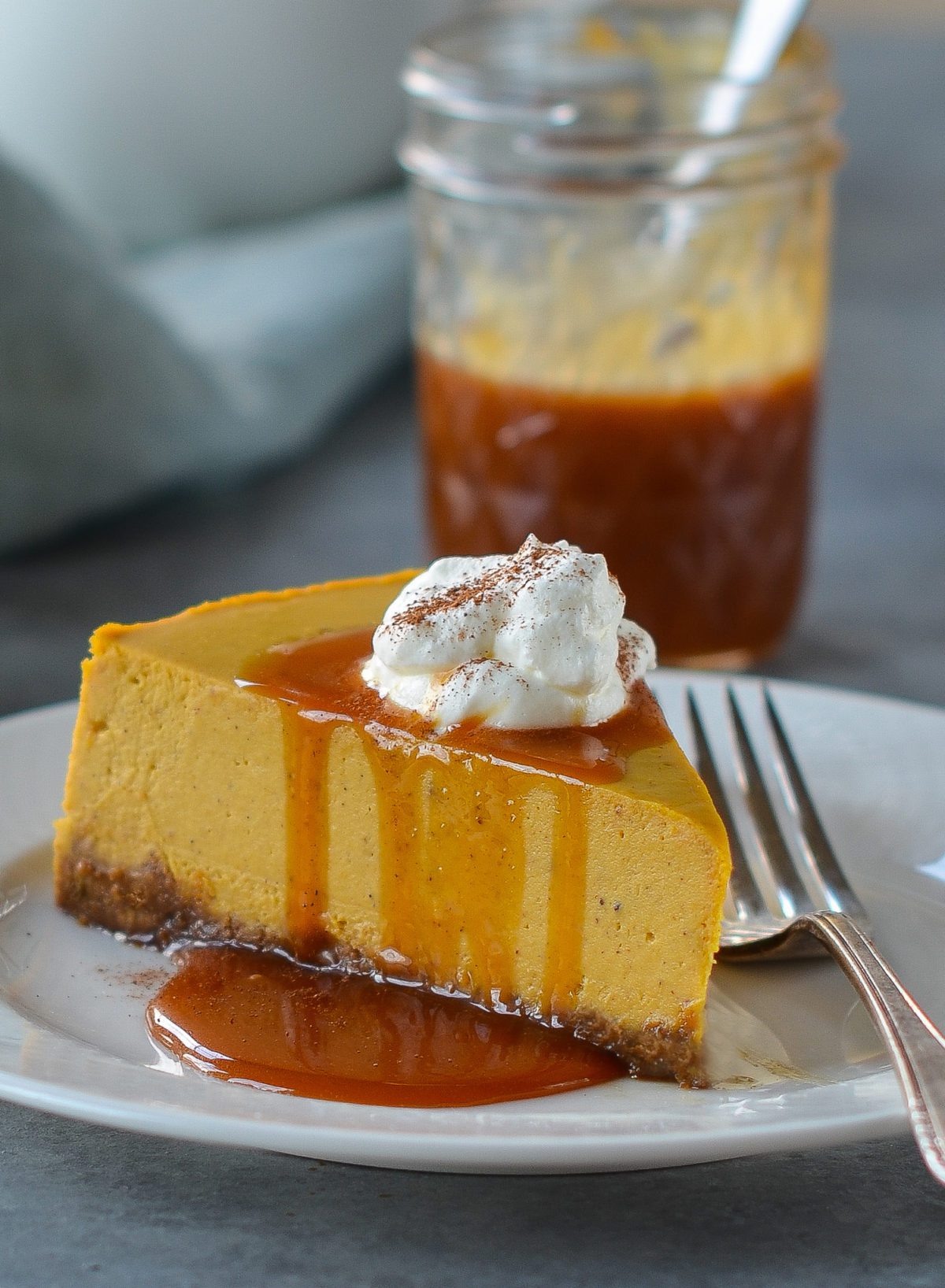 https://www.onceuponachef.com/images/2012/11/Pumpkin-Cheesecake_Gingernsap_Crust_Caramel_Sauce-2-1200x1636.jpg