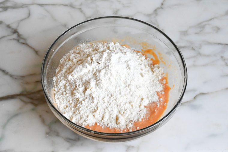 sweet potato mixture and flour/butter mixture in bowl