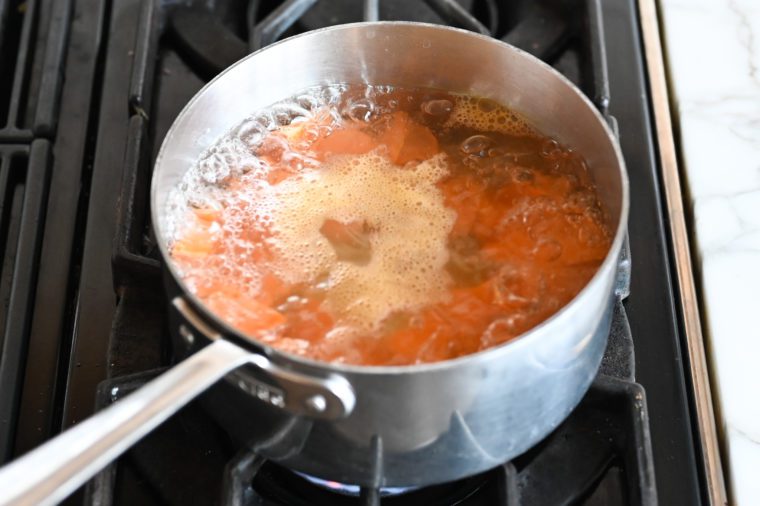 Pot of boiling sweet potatoes.