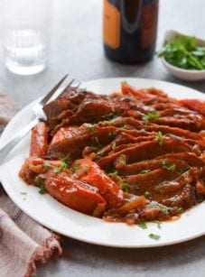 Plate of onion-braised beef brisket.