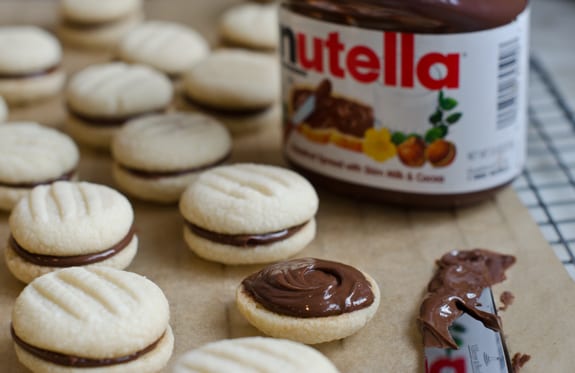 Jar of Nutella with Nutella cookies.