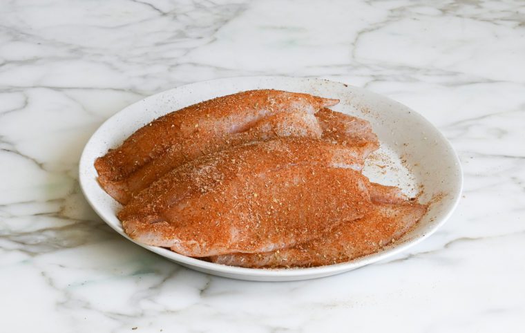 tilapia fillets coated with rub