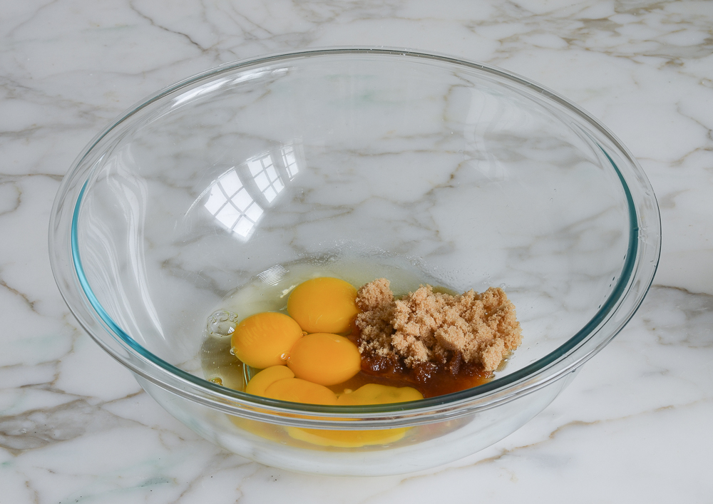 eggs, vanilla, and brown sugar in a mixing bowl