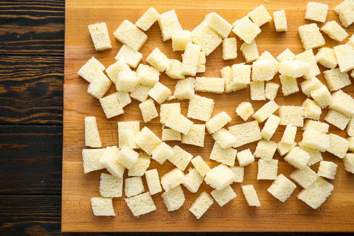 bread cubes on cutting board